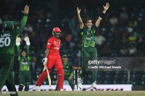 Ruvindu Gunasekera of Canada is trapped lbw off the bowling of Umar Gul during the Canada v Pakistan 2011 ICC World Cup Group A match at the R....