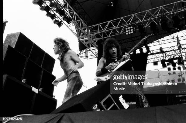 Jon Bon Jovi and Richie Sambora of Bon Jovi perform on stage at Nagoya Stadium for Super Rock '84, 4th August 1984, Tokyo, Japan.