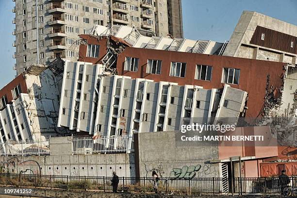 Building destroyed by an earthquake one year ago, in Concepcion some 500 km south of Santiago on February 7, 2011. The massive earthquake that struck...