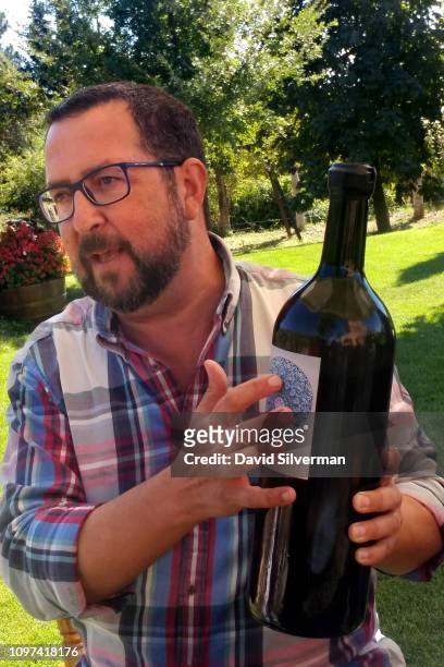 Moises Cohen, owner and winemaker of Elvi Wines, holds a double-magnum bottle of his Clos Mesorah 2013 Montsant DO blend of Cariñena , Garnacha and...