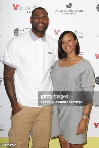 LeBron James and Savannah Brinson attend the LeBron James Family Foundation Hewlett-Packard computer give announcement and American signature teen &...