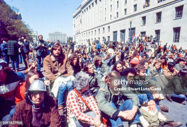 Protestors sit in the street, participating in demonstrations related to the Vietnam War May Day Protests, Washington, DC, May 1971.