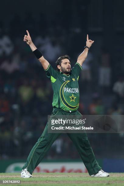 Shahid Afridi of Pakistan celebrates bowling immy Hansra during the Canada v Pakistan 2011 ICC World Cup Group A match at the R. Premadasa Stadium on...