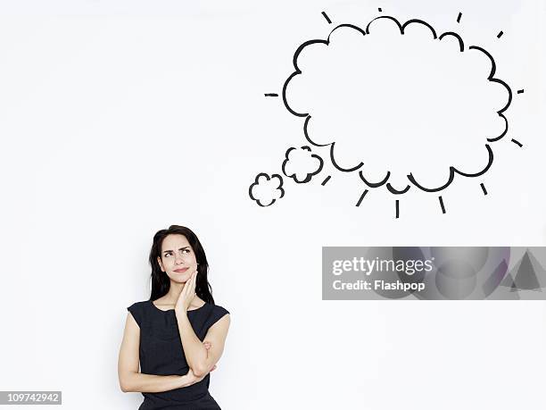 businesswoman thinking. thought bubble above - thought bubble foto e immagini stock