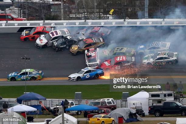 Cars crash during the Monster Energy NASCAR Cup Series Advance Auto Parts Clash at Daytona International Speedway on February 10, 2019 in Daytona...