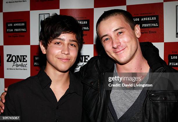 Actors Lorenzo James Henrie and Alex Frost pose during the "Secrets Of The Tribe" Q&A during the 2010 Los Angeles Film Festival at Regal Cinemas at...