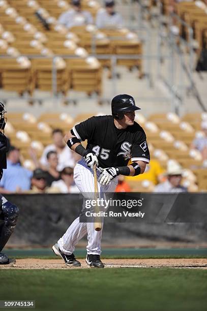 Dallas McPherson of the Chicago White Sox bats against the Milwaukee Brewers on March 01, 2011 at The Ballpark at Camelback Ranch in Glendale,...