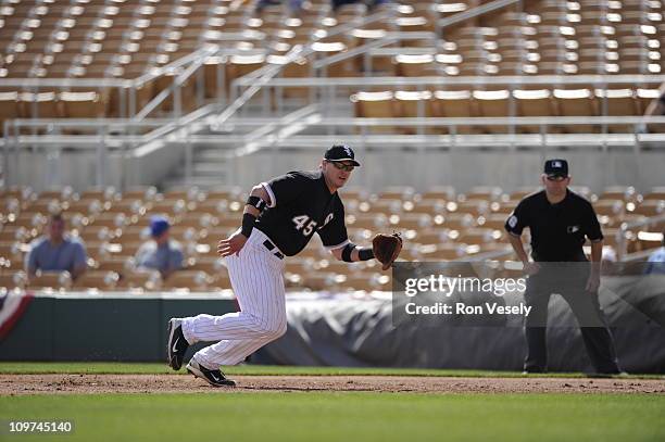 Dallas McPherson of the Chicago White Sox fields against the Milwaukee Brewers on March 01, 2011 at The Ballpark at Camelback Ranch in Glendale,...