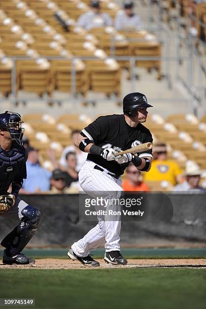 Dallas McPherson of the Chicago White Sox bats against the Milwaukee Brewers on March 01, 2011 at The Ballpark at Camelback Ranch in Glendale,...