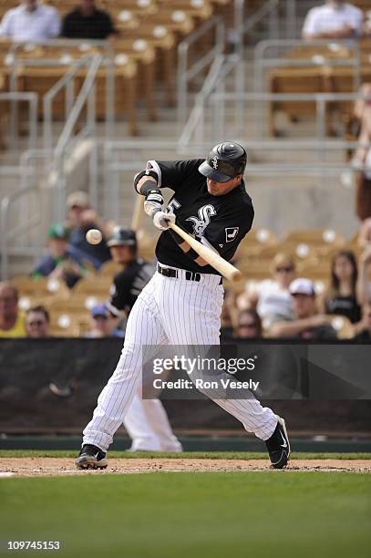 Dallas McPherson of the Chicago White Sox bats against the Milwaukee Brewers on March 01, 2011 at The Ballpark at Camelback Ranch in Glendale,...