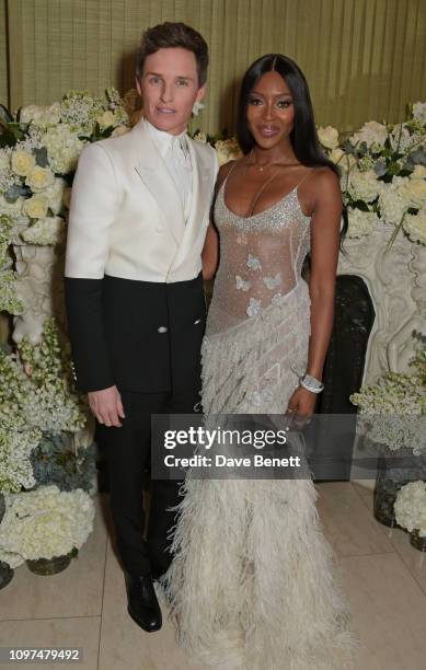 Eddie Redmayne and Naomi Campbell wearing Tiffany & Co. Attend the British Vogue and Tiffany & Co. Celebrate Fashion and Film Party at Annabel's on...