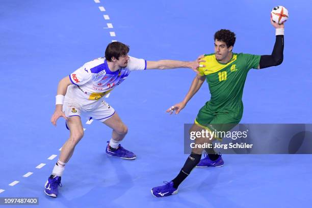 Viran Morros de Argila of Spain challenges Jose Toledo of Brazil during the 26th IHF Men's World Championship group 1 match between Spain and Brazil...