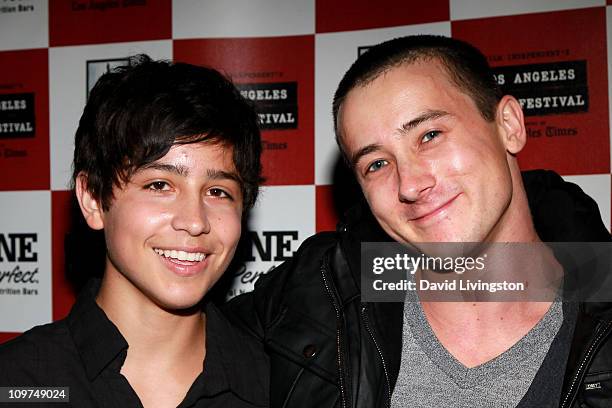 Actors Lorenzo James Henrie and Alex Frost pose during the "Secrets Of The Tribe" Q&A during the 2010 Los Angeles Film Festival at Regal Cinemas at...