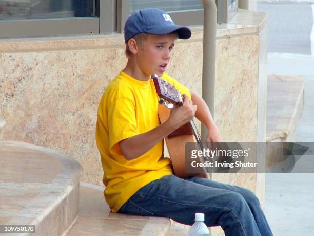 Justin Bieber performs on the street August 20, 2007 in Stratford, Canada.