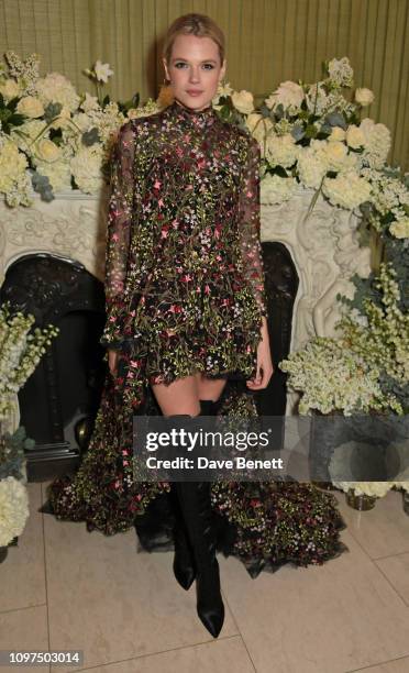 Gabriella Wilde wearing Tiffany & Co. Attends the British Vogue and Tiffany & Co. Celebrate Fashion and Film Party at Annabel's on February 10, 2019...