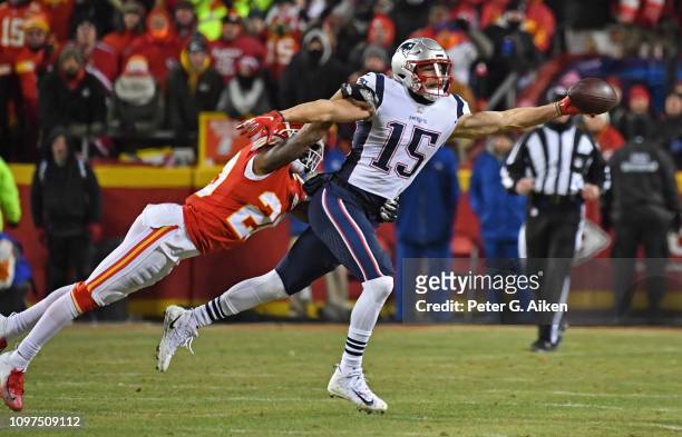 Wide receiver Chris Hogan of the New England Patriots stretches out to make a one handed catch against cornerback Steven Nelson of the Kansas City...