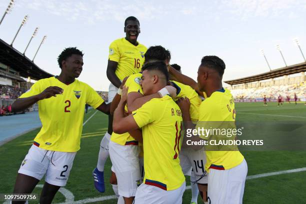Ecuador's Leonardo Campana celebrates with teammates after scoring against Venezuela during their South American U-20 football match at El Teniente...