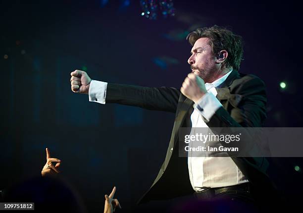 Simon Le Bon performs live with Duran Duran during the Ice & Diamonds Send-Off Ball in aid of Walking With The Wounded at Battersea Power station on...