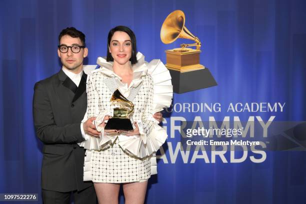 Jack Antonoff and St. Vincent pose with their award at 61st Annual GRAMMY Awards Premiere Ceremony at Microsoft Theater on February 10, 2019 in Los...