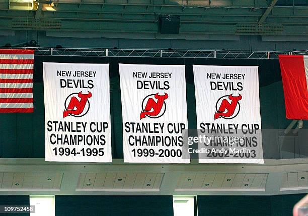 General view of the three Stanley Cup Championship banners of the New Jersey Devils hanging in the rafters during the game against the Tampa Bay...