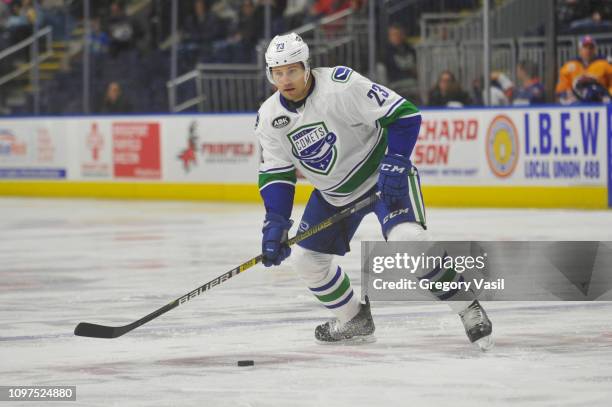 Luke Schenn of the Utica Comets looks to pass during a game against the Bridgeport Sound Tigers at Webster Bank Arena on February 10, 2019 in...