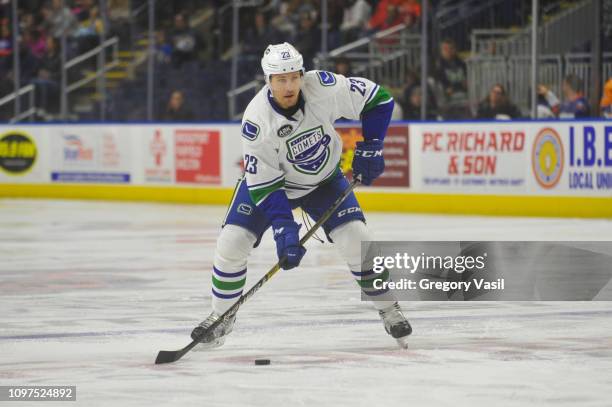 Luke Schenn of the Utica Comets looks to pass during a game against the Bridgeport Sound Tigers at Webster Bank Arena on February 10, 2019 in...