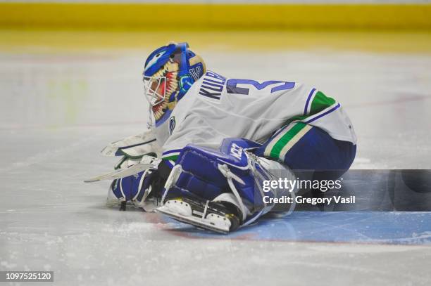 Ivan Kulbakov of the Utica Comets stretches prior to the start of the second period during a game against the Bridgeport Sound Tigers at Webster Bank...