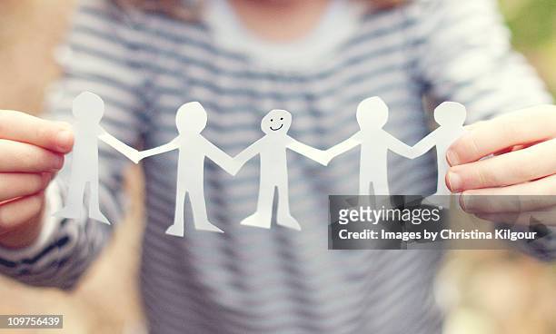 keep smiling - human chain stock pictures, royalty-free photos & images