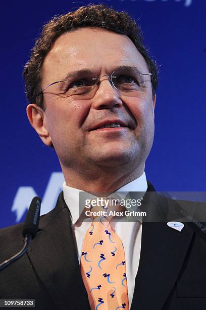 German Interior Minister Hans-Peter Friedrich addresses the media during a press conference at the Munich 2018 media center on March 4, 2011 in...