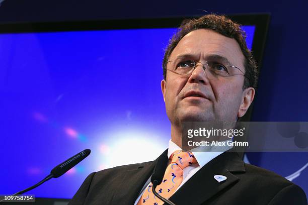 German Interior Minister Hans-Peter Friedrich addresses the media during a press conference at the Munich 2018 media center on March 4, 2011 in...