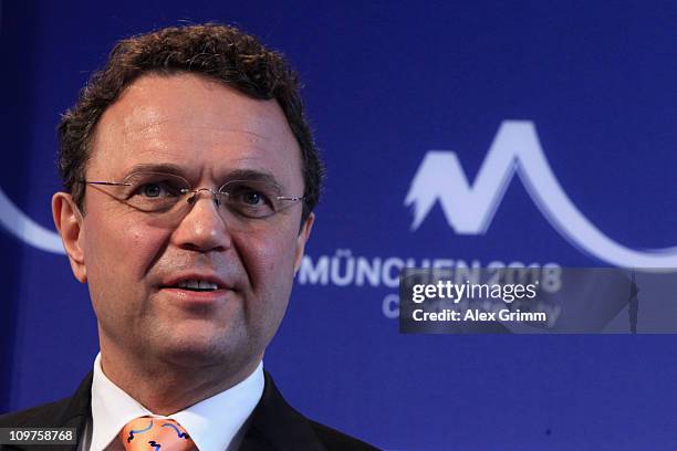 German Interior Minister Hans-Peter Friedrich addresses the media during a press conference at the Munich 2018 media center on March 4, 2011 in...