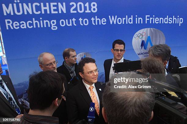 German Interior Minister Hans-Peter Friedrich addresses the media during a press conference at the Munich 2018 media center on March 4, 2011 in...