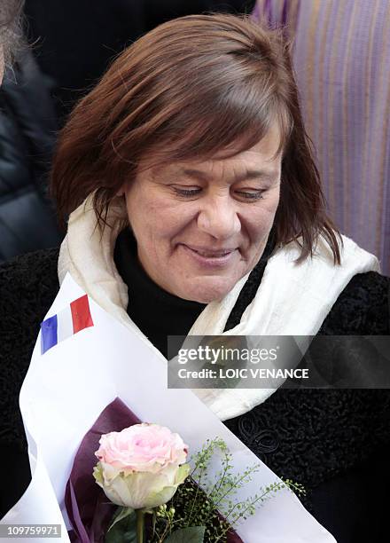 French actress Annie Girardot's daughter Giulia Salvatori leaves the Saint-Roch church after her mother funeral, on March 4, 2011. Girardot who...