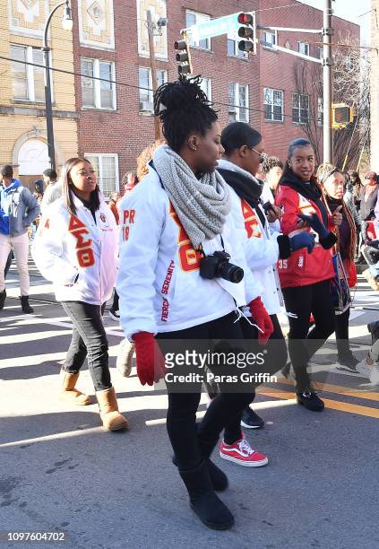 Members of Delta Sigma Theta Sorority, Inc. Walk during the 2019 Martin Luther King, Jr. Annual Parade on January 21, 2019 in Atlanta, Georgia.