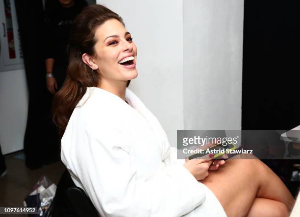 Model Ashley Graham prepares backstage for TRESemme at Prabal Gurung during NYFW on February 10, 2019 in New York City.