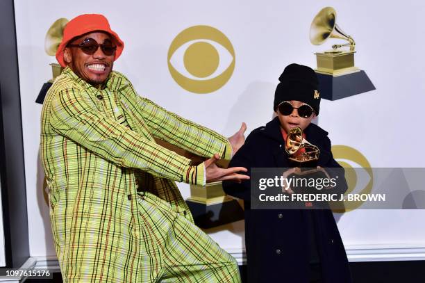 Musician Anderson .Paak and his son Soul Rasheed poses with his award for best rap performance in the press room during the 61st Annual Grammy Awards...