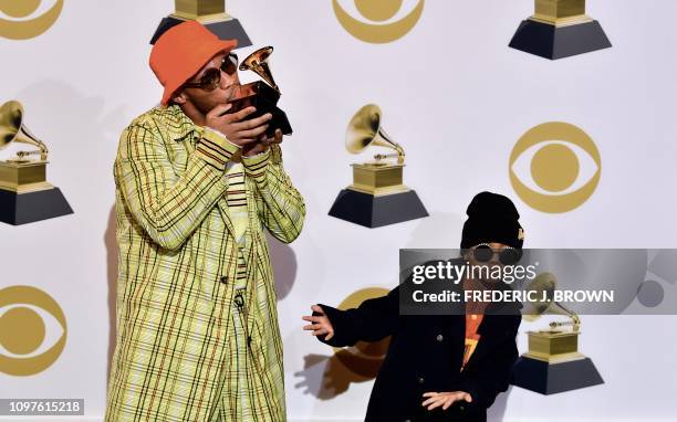 Musician Anderson .Paak and his son Soul Rasheed poses with his award for best rap performance in the press room during the 61st Annual Grammy Awards...