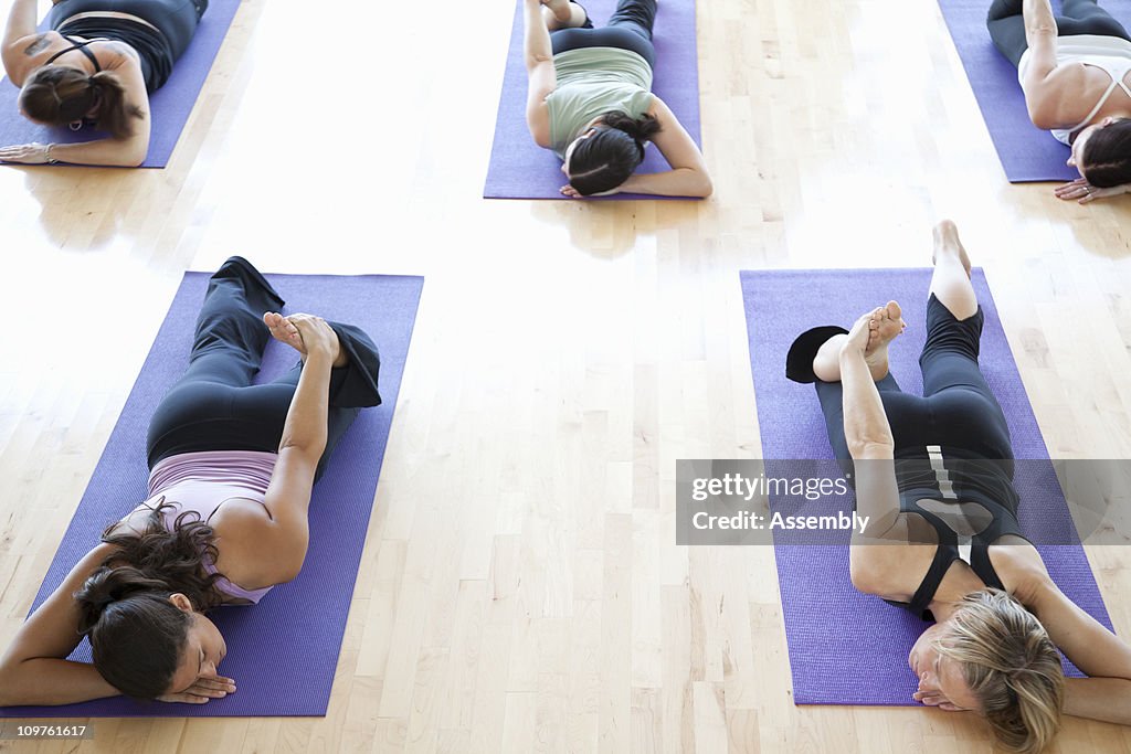 Women stretching in yoga class