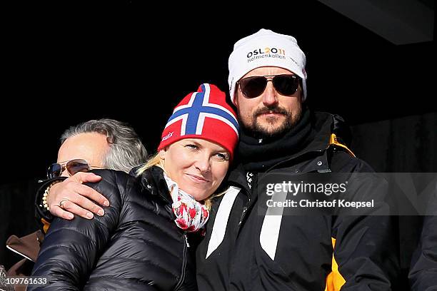 Crown Princess Mette-Marit of Norway and Crown Prince Haakon of Norway attend the Men's Cross Country 4x10km Relay race during the FIS Nordic World...