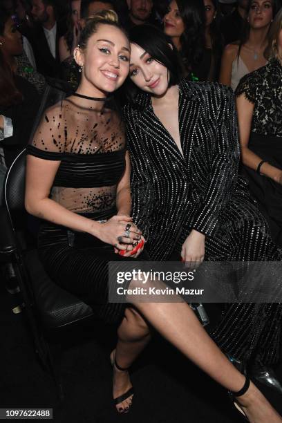 Miley Cyrus and Noah Cyrus pose during the 61st Annual GRAMMY Awards at Staples Center on February 10, 2019 in Los Angeles, California.