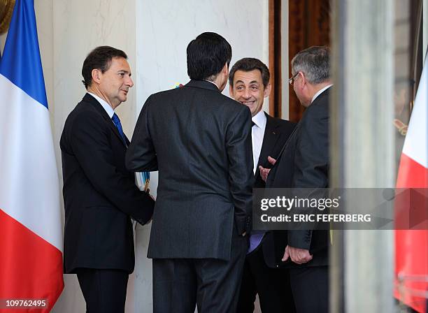 French President Nicolas Sarkozy chats with French Justice Minister Michel Mercier , French Prime Minister Francois Fillon and French Energy and...