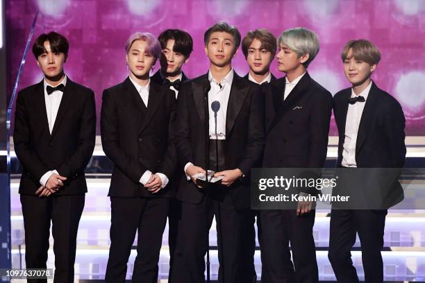 And fellow BTS members speak onstage during the 61st Annual GRAMMY Awards at Staples Center on February 10, 2019 in Los Angeles, California.