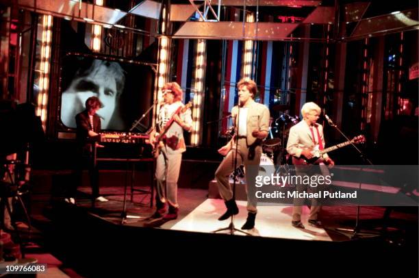 Nick Rhodes, John Taylor, Simon Le Bon, Roger Taylor and Andy Taylor of Duran Duran performing 'Girls on Film' on the BBC television show Top of the...