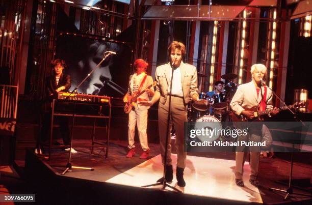 Nick Rhodes, John Taylor, Simon Le Bon, Roger Taylor and Andy Taylor of Duran Duran performing 'Girls on Film' on the BBC television show Top of the...