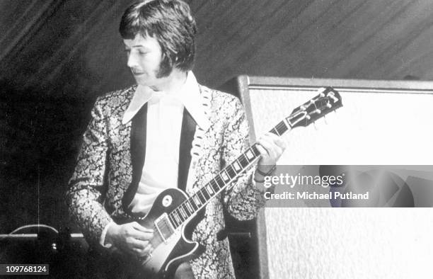 British guitarist Eric Clapton performing on stage with Cream during their first live appearance at the Windsor Jazz and Blues Festival in Berkshire,...