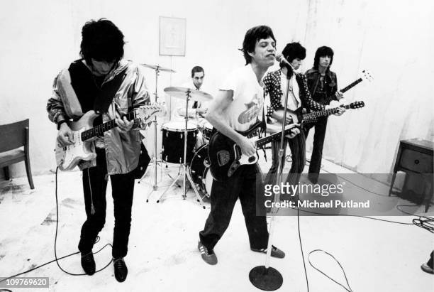 Guitarist Ronnie Wood, drummer Charlie Watts, singer Mick Jagger, guitarist Keith Richards and bassist Bill Wyman during the production of the music...