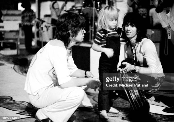 7th SEPTEMBER: Singer Mick Jagger of the Rolling Stones backstage with guitarist Keith Richards and his son Marlon at Wembley Empire Pool in London,...