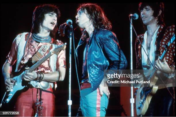 Guitarist Ronnie Wood, singer Mick Jagger and Keith Richards of the Rolling Stones performing on stage at the Knebworth Fair in Hertfordshire,...