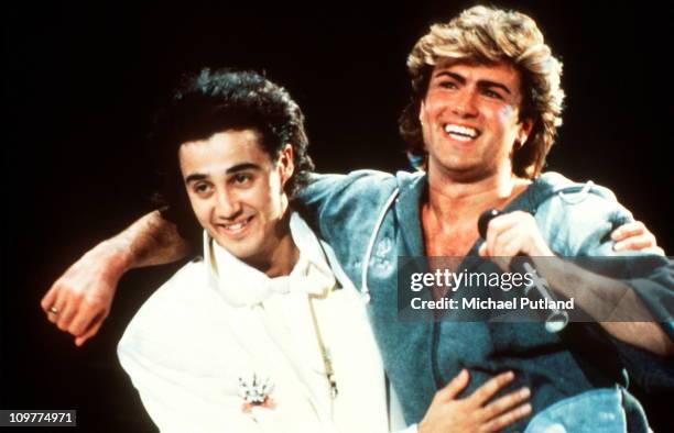 Andrew Ridgeley and George Michael of Wham performing on stage in 1985.