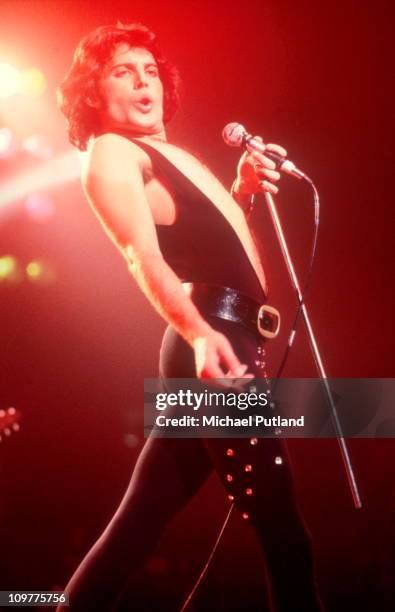 Singer Freddie Mercury of British rock band Queen performing on stage in 1975.